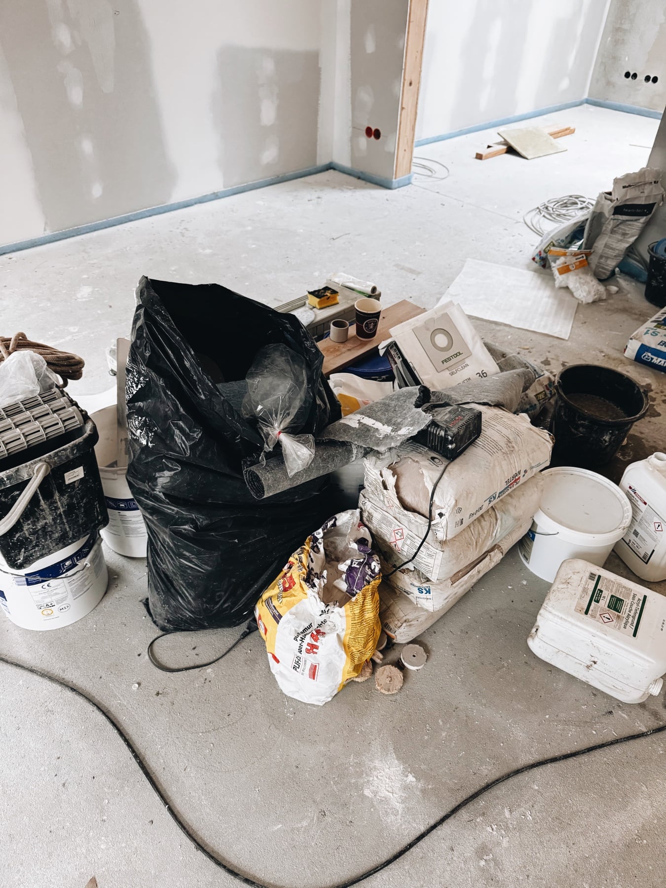 Buckets and sacks on the ground floor