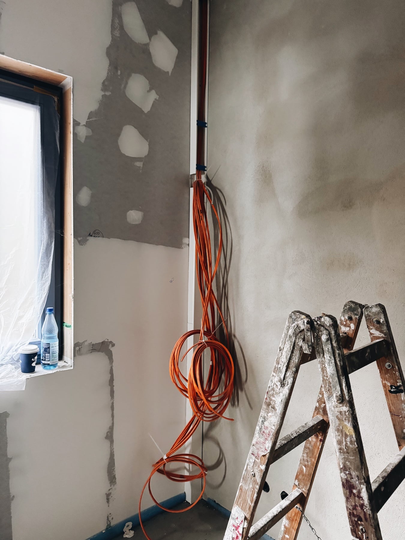 Cables and ladders against the wall